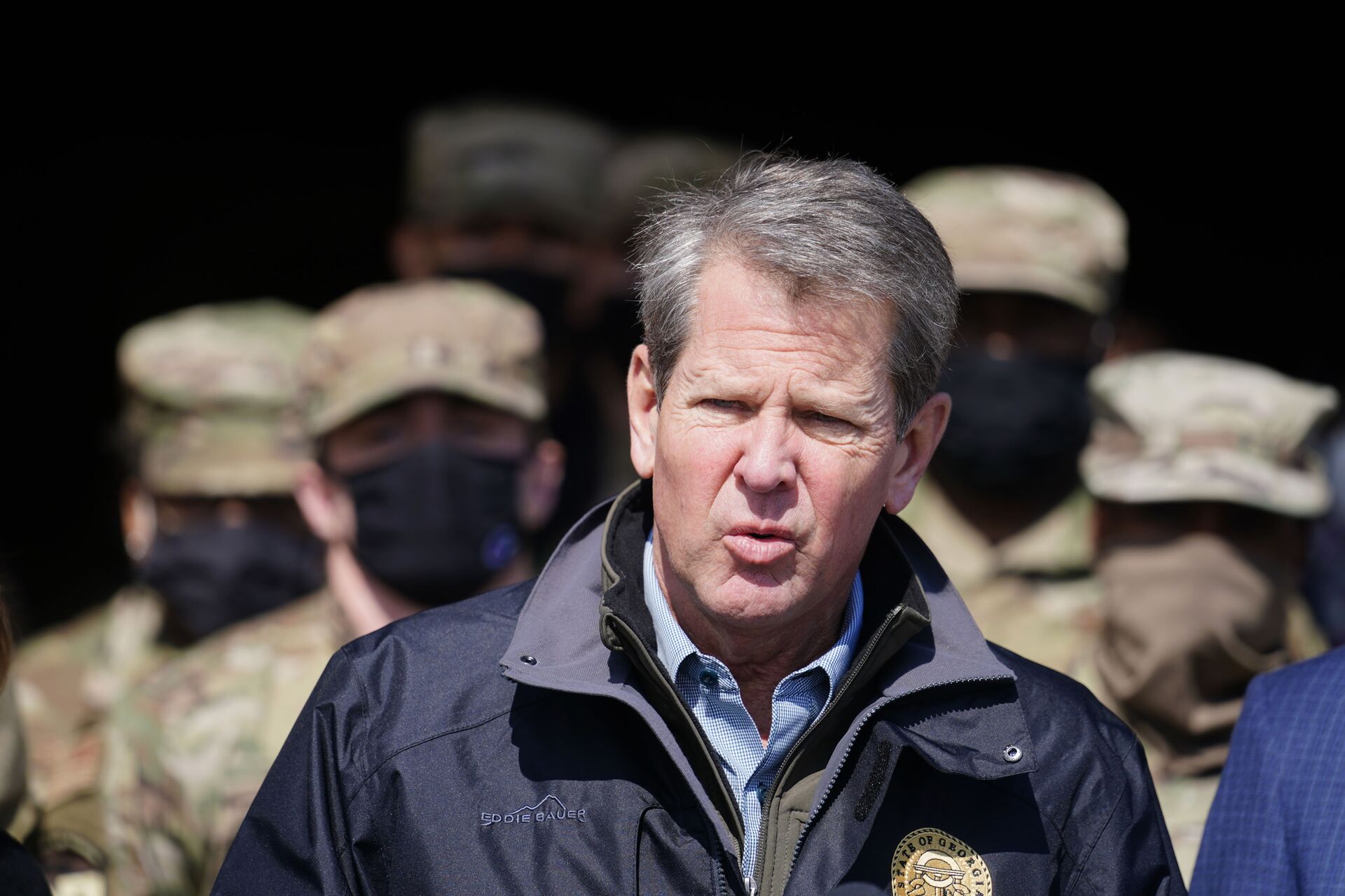 Georgia Gov. Brian Kemp speaks to reporters after touring a mass vaccination site at the Macon State Farmers Market on Friday, Feb. 19, 2021, in Atlanta. - Sputnik International, 1920, 27.01.2023