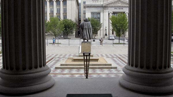In this Aug. 17, 2010 file photo, a statue of the Albert Gallatin, the 4th Secretary of the Treasury, stands on the north patio of the US Treasury Building in Washington - Sputnik International