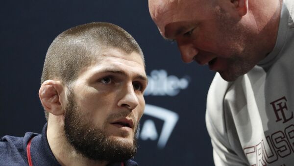 Khabib Nurmagomedov, left, listens to Dana White during a news conference for the UFC 229 mixed martial arts bouts Thursday, Oct. 4, 2018, in Las Vegas. - Sputnik International