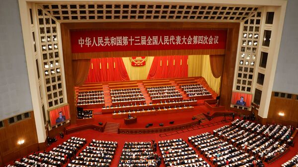 Chinese Premier Li Keqiang speaks at the opening session of the National People's Congress (NPC) at the Great Hall of the People in Beijing, China March 5, 2021. - Sputnik International