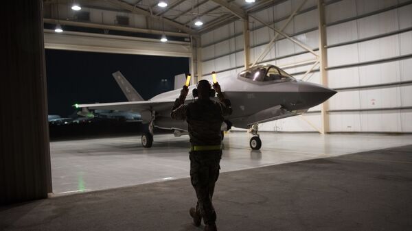 In this Sept. 10, 2019, photo released by the U.S. Air Force, an F-35A Lightning II fighter jet is directed out of a hangar at Al-Dhafra Air Base in the United Arab Emirates. - Sputnik International