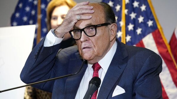 In this Nov. 19, 2020, file photo, former New York Mayor Rudy Giuliani, who was a lawyer for President Donald Trump, speaks during a news conference at the Republican National Committee headquarters in Washington - Sputnik International