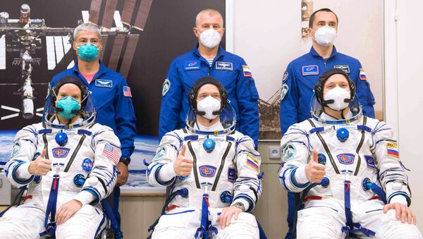 Members of the 64th expedition prime crew to the International Space Station (ISS), NASA astronaut Kathleen Rubins and Roscosmos cosmonauts Sergei Ryzhikov, Sergei Kud-Sverchkov (from left to right) in the front row and members of the 64th expedition backup crew, NASA astronaut Mark Wande Hai and cosmonauts Roscosmos Oleg Novitsky, Pyotr Dubrov (left to right in the second row) before the launch of the Soyuz-2.1a carrier rocket with the Soyuz MS-17 manned transport vehicle from the launch pad # 31 of the Baikonur cosmodrome. Image is a handout provided by a third party. - Sputnik International