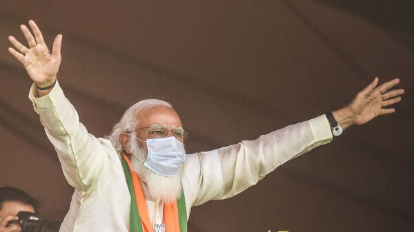 India's Prime Minster Narendra Modi addresses supporters of the Bharatiya Janata Party (BJP) during a mass rally ahead of the state legislative assembly elections at the Brigade Parade ground in Kolkata on March 7, 2021. - Sputnik International