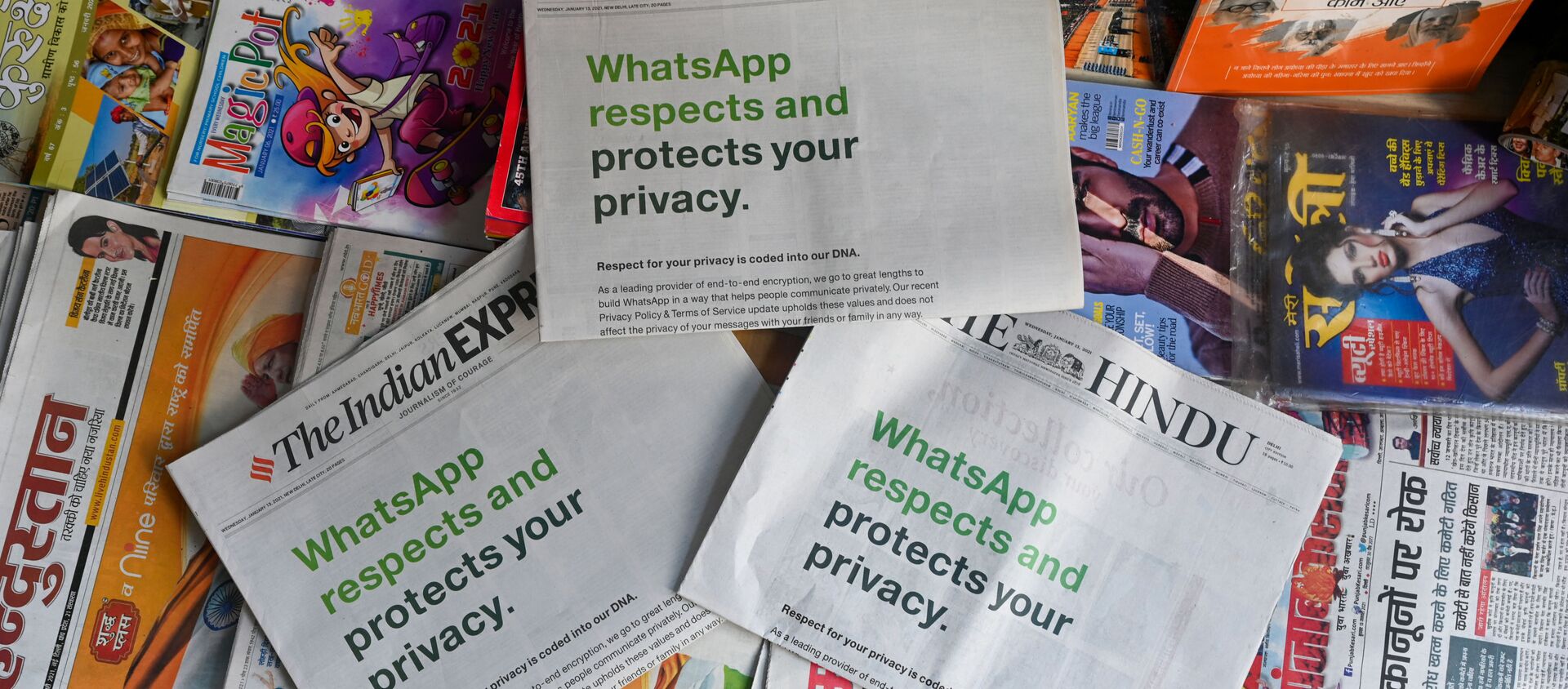 An advertisement from WhatsApp is seen in a newspaper at a stall in New Delhi on January 13, 2021 - Sputnik International, 1920, 25.03.2021