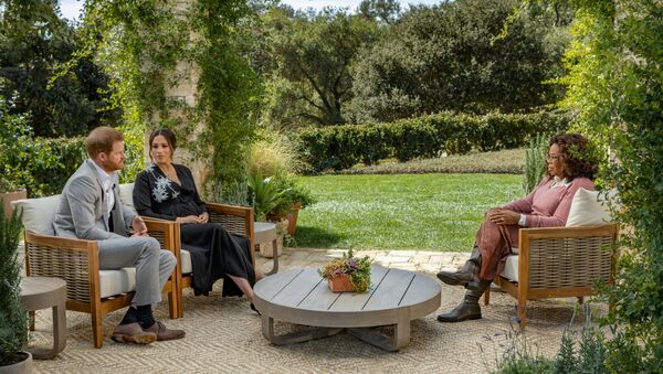 FILE PHOTO: Britain's Prince Harry and Meghan, Duchess of Sussex, are interviewed by Oprah Winfrey in this undated handout photo.  - Sputnik International
