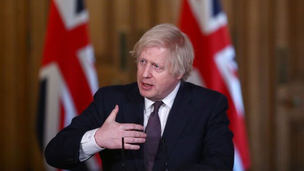 Britain's Prime Minister Boris Johnson holds a virtual news conference at 10 Downing Street, amid the coronavirus disease (COVID-19) outbreak, in London, Britain, 8 March 2021. - Sputnik International