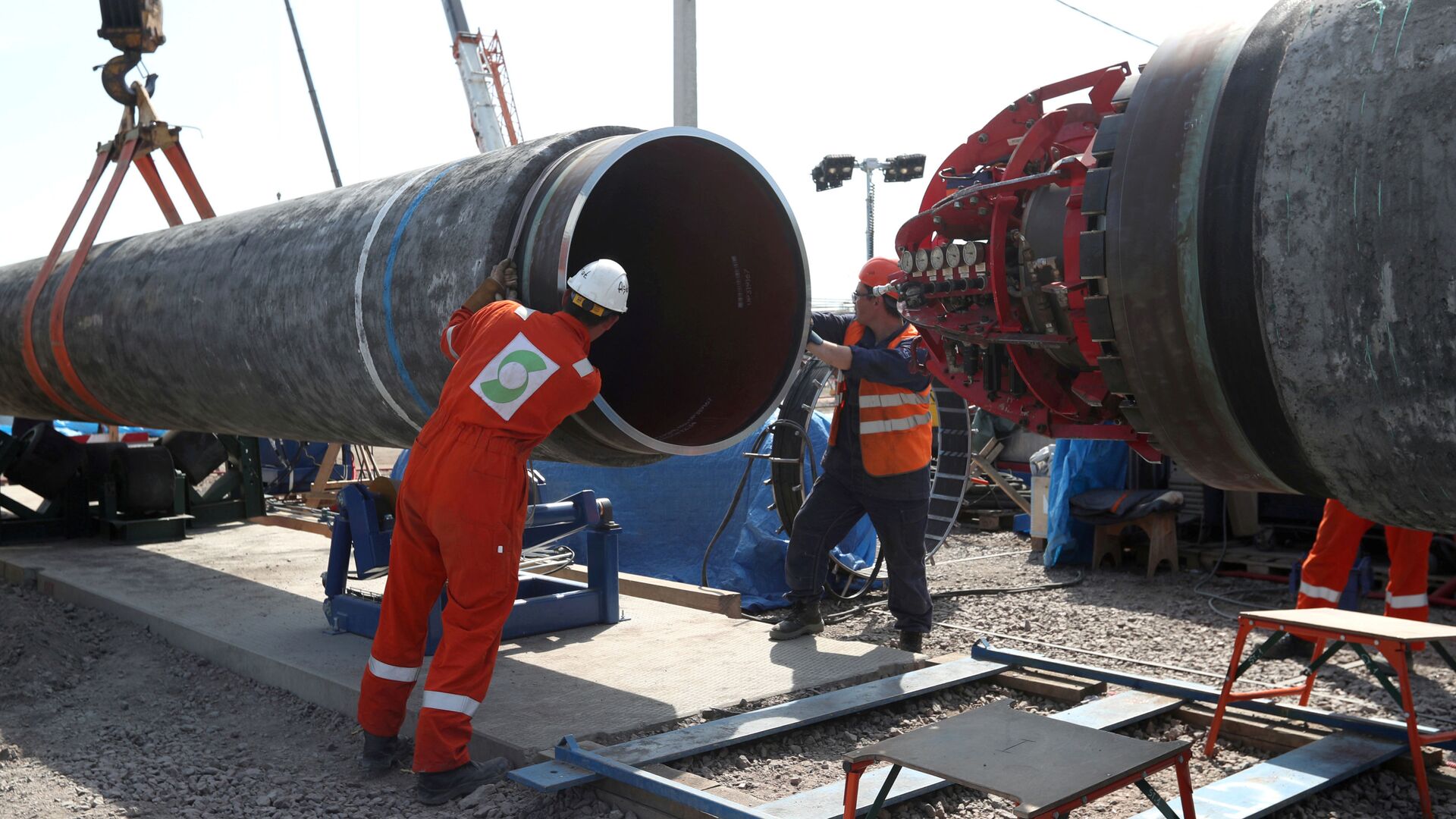 FILE PHOTO: FILE PHOTO: Workers are seen at the construction site of the Nord Stream 2 gas pipeline, near the town of Kingisepp, Leningrad region, Russia, June 5, 2019 - Sputnik International, 1920, 01.04.2021