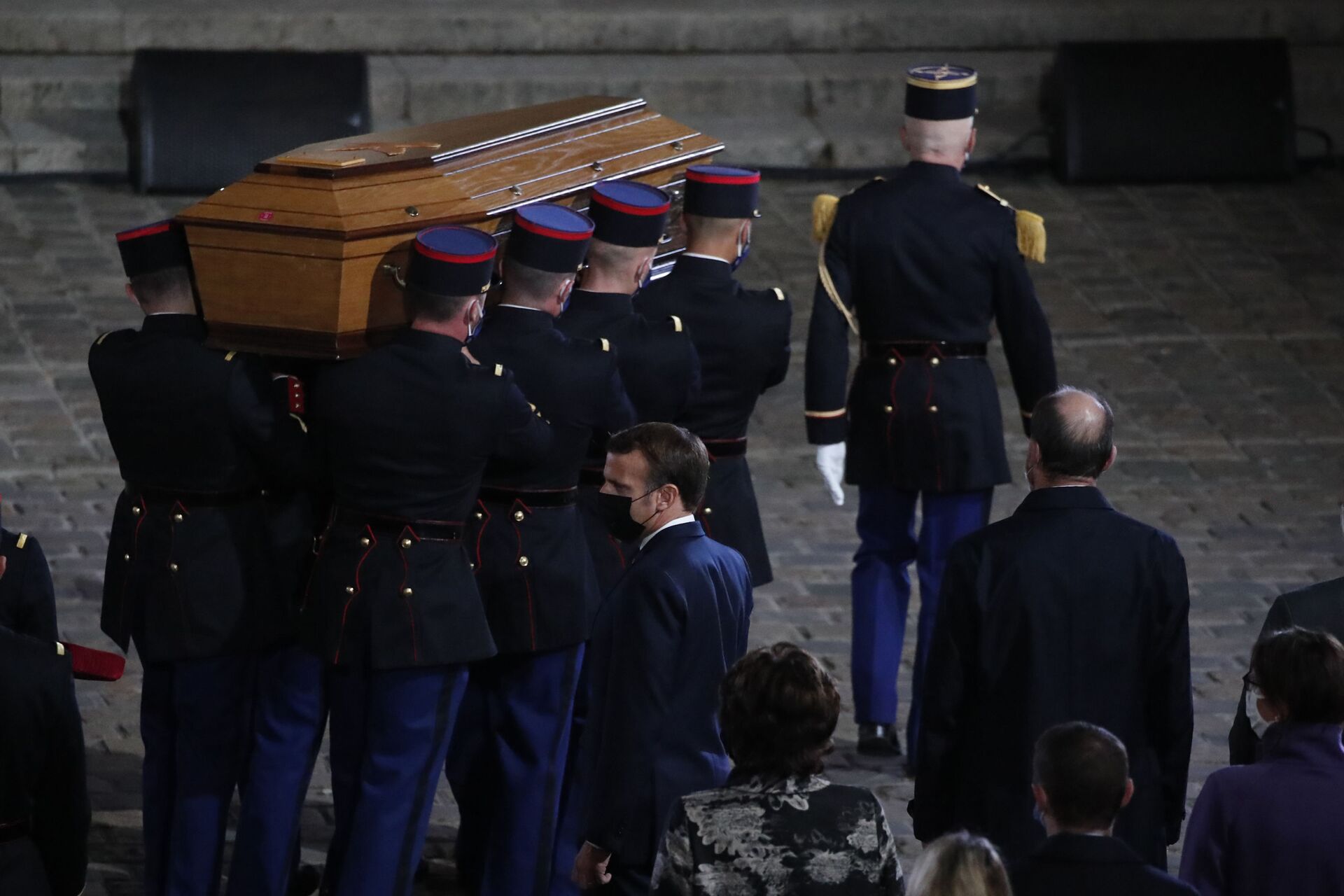 The coffin of slain teacher Samuel Paty is carried in the courtyard of the Sorbonne university during a national memorial event, Wednesday, Oct. 21, 2020 in Paris. - Sputnik International, 1920, 07.09.2021