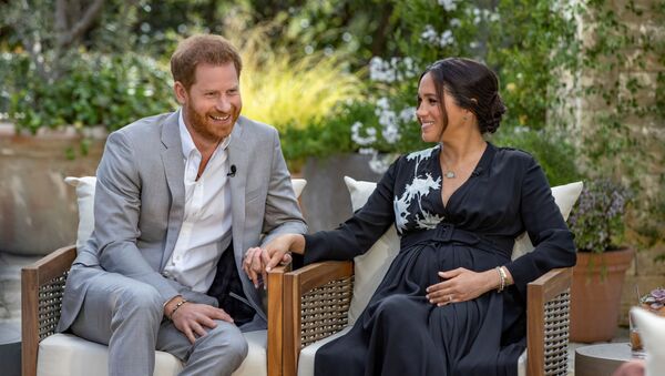 Prince Harry and Meghan, The Duke and Duchess of Sussex, give an interview to Oprah Winfrey in this undated handout photo - Sputnik International