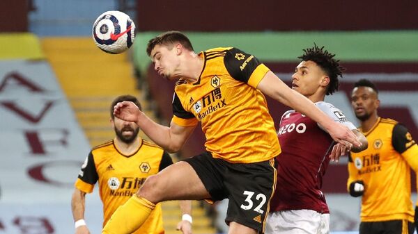 Wolverhampton Wanderers' Leander Dendoncker heads the ball during a Premier League match - Sputnik International