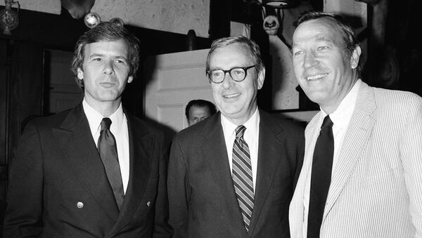 Veteran NBC news anchorman John Chancellor announced  in New York Wednesday, July 1, 1981 that he will become an elder statesman next spring to make way for a new anchor team of Tom Brokaw, left, and Roger Mudd, right, for NBC Network's Nightly News.  (AP Photo) - Sputnik International