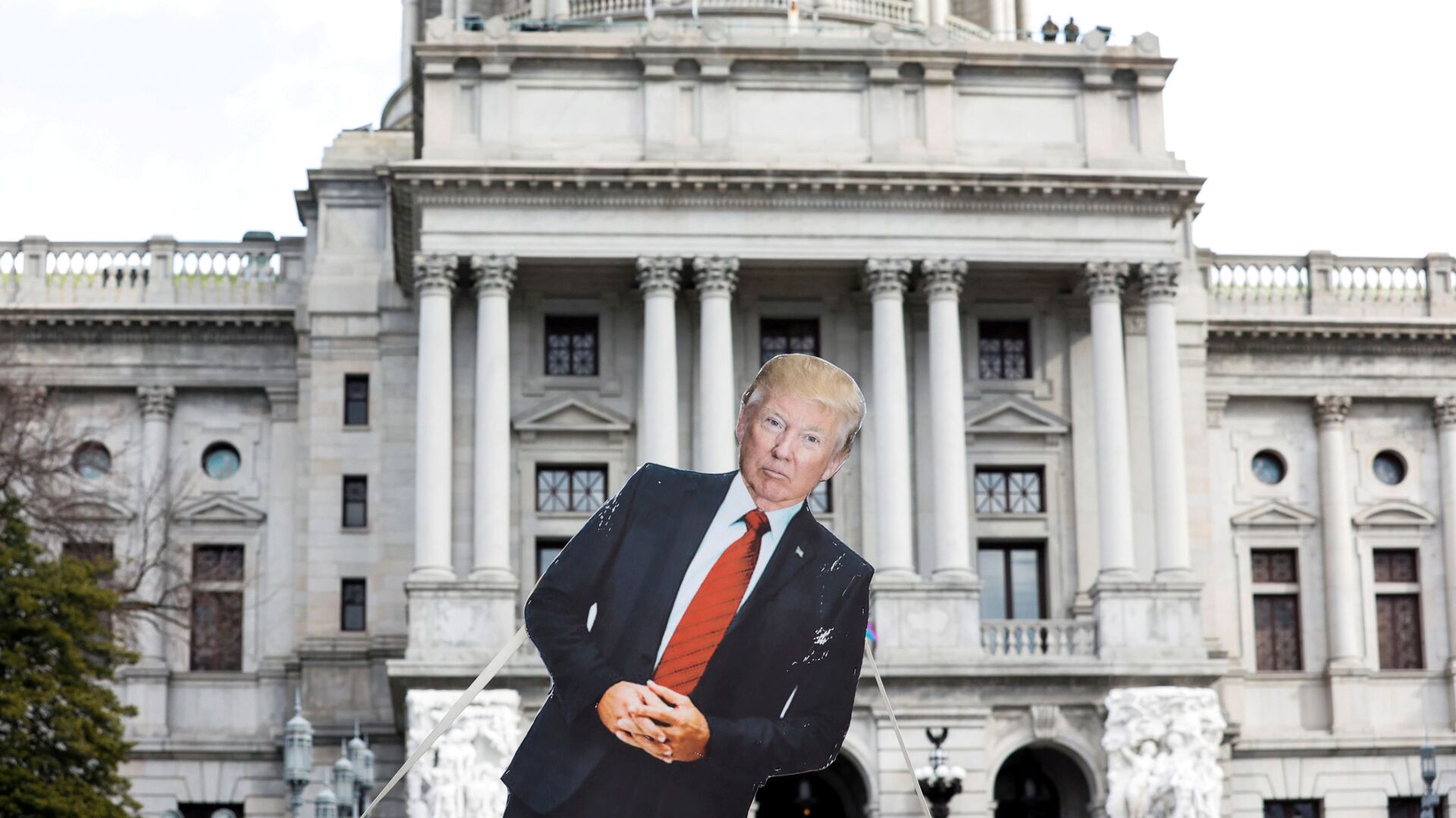A cardboard cutout depicting U.S. President Donald Trump is seen in front of Pennsylvania State Capitol, as supporters of him are expected to protest against the election of President-elect Joe Biden, outside the Pennsylvania State Capitol in Harrisburg, Pennsylvania, U.S. January 17, 2021 - Sputnik International, 1920, 02.11.2021