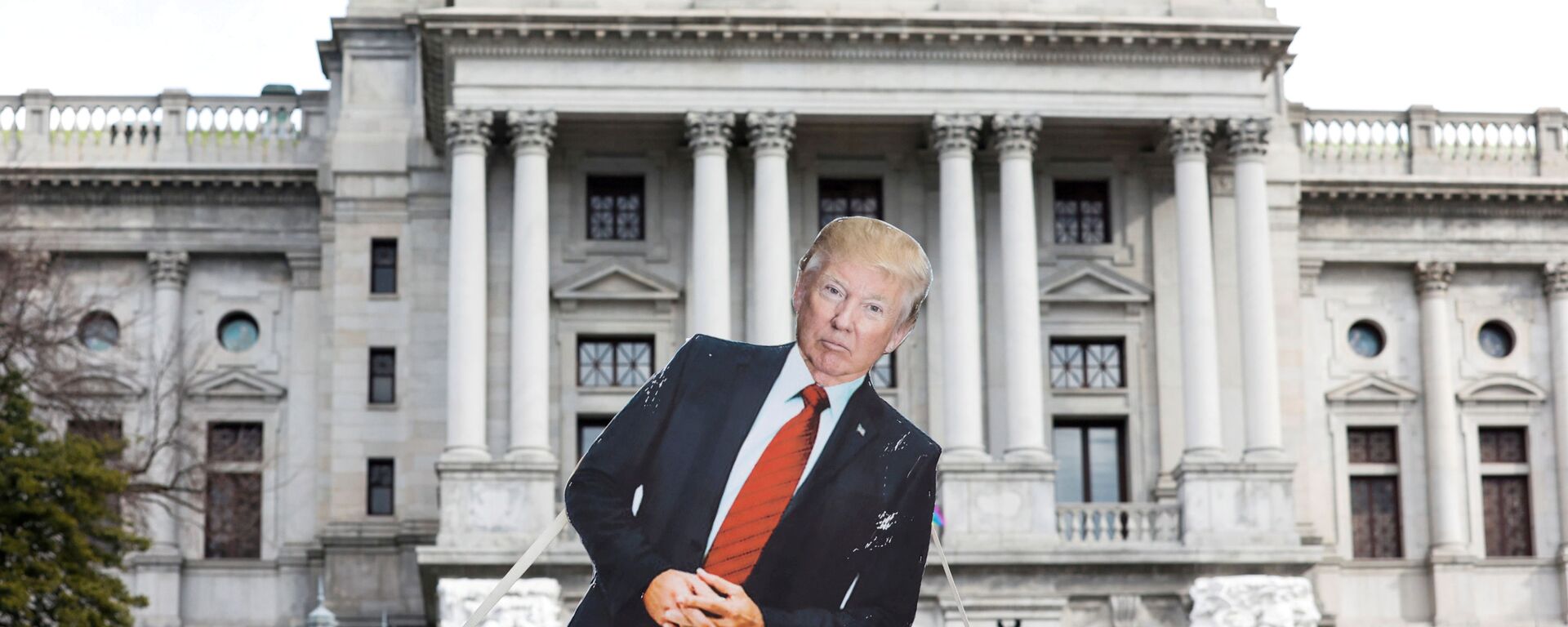 A cardboard cutout depicting U.S. President Donald Trump is seen in front of Pennsylvania State Capitol, as supporters of him are expected to protest against the election of President-elect Joe Biden, outside the Pennsylvania State Capitol in Harrisburg, Pennsylvania, U.S. January 17, 2021 - Sputnik International, 1920, 02.11.2021