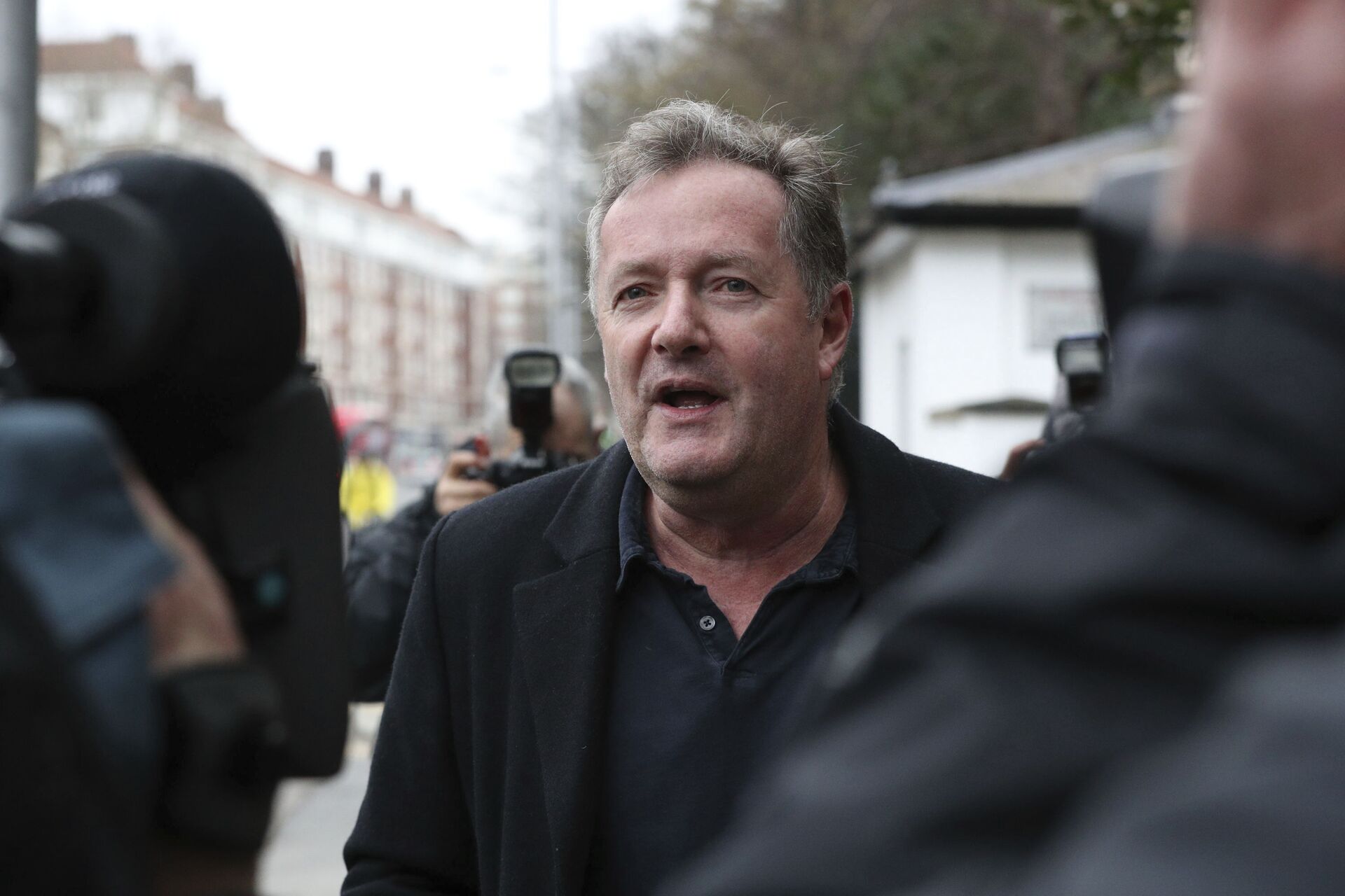 British television host Piers Morgan speaks to reporters outside his home in Kensington, central London, Wednesday March 10, 2021 - Sputnik International, 1920, 27.09.2021