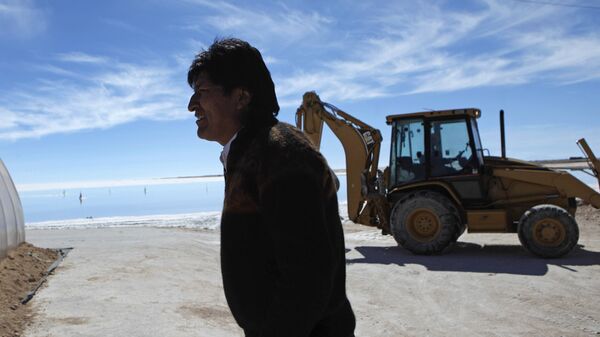 Bolivia's President Evo Morales tours a semi-industrial plant to produce potassium chloride, used to manufacture batteries based on lithium, after its opening ceremony at the Uyuni salt desert, outskirts of Llipi, Bolivia, Thursday, Aug. 9, 2012. The salt flats of Uyuni have triggered international interest among energy companies due to its lithium reserves.  - Sputnik International
