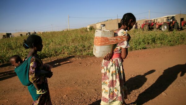 Ethiopian refugees fleeing from the ongoing fighting in Tigray region arrive at a camp in the Fashaga Triangle. - Sputnik International