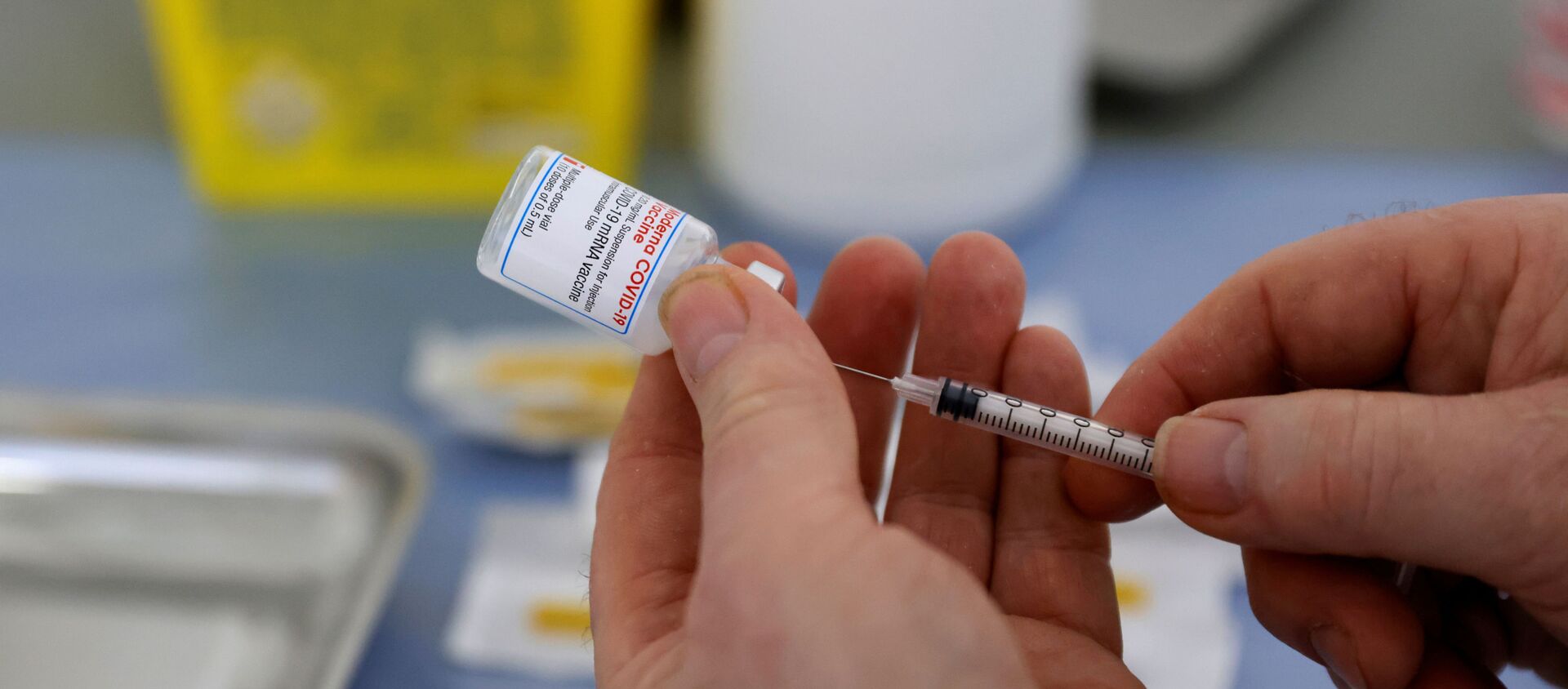 FILE PHOTO: A health worker prepares a syringe with a dose of the Moderna COVID-19 vaccine at a vaccination center in Calais as part of the coronavirus disease (COVID-19) vaccination campaign in France, March 4, 2021. - Sputnik International, 1920
