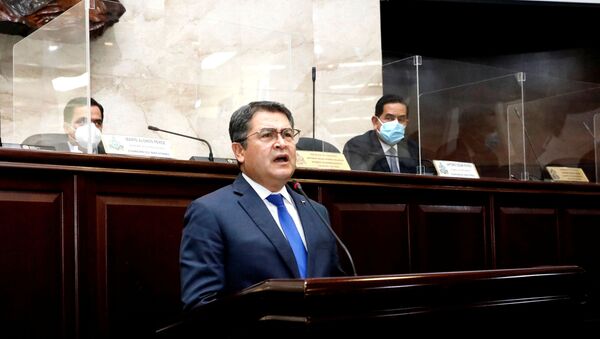 Honduras' President Juan Orlando Hernandez addresses the Congress to inform about security and organized crime, in Tegucigalpa, Honduras February 24, 2021 - Sputnik International