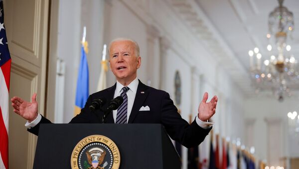 U.S. President Joe Biden delivers his first prime time address as president, marking the one-year anniversary of widespread shutdowns to combat the coronavirus disease (COVID-19) pandemic, and speak about the impact of the pandemic during an address from the East Room of the White House in Washington, U.S., March 11, 2021 - Sputnik International