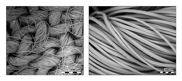 Fibres of a face mask made of rayon photographed using a scanning electron microscope. 

 - Sputnik International