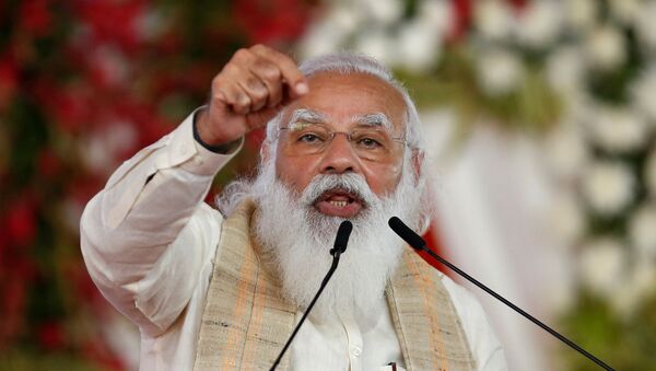 India's Prime Minister Narendra Modi addresses a gathering before flagging off the Dandi March, or Salt March, to celebrate the 75th anniversary of India's Independence, in Ahmedabad, India, March 12, 2021 - Sputnik International