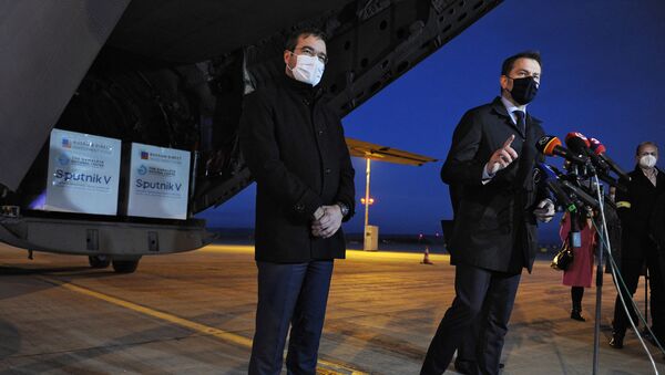 Slovak Prime Minister Igor Matovic (R) and Slovak Health Minister Marek Krajci give a press statement at the International Airport in Kosice, Slovakia, on March 1, 2021, after an aircraft of the Slovak Army arrived from Moscow, carrying doses of the Sputnik V vaccine against the coronavirus (Covid-19).  - Sputnik International
