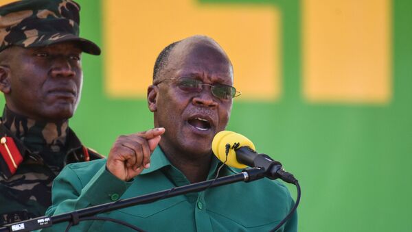 In this file photo taken on August 29, 2020 Tanzania's incumbent President and presidential candidate of ruling party Chama Cha Mapinduzi (CCM) John Magufuli (R) speaks during the official launch of the party's campaign for the October general election at the Jamhuri stadium in Dodoma, Tanzania - Sputnik International