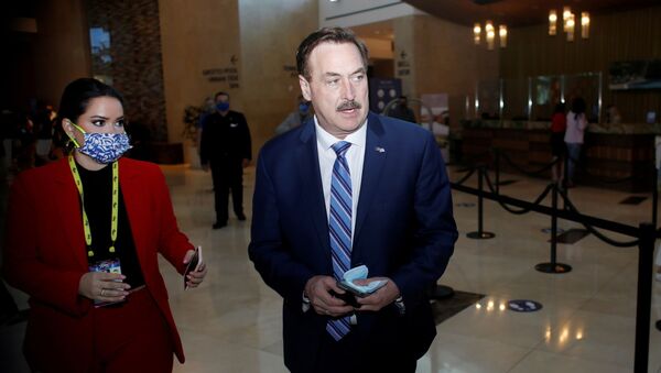 MyPillow Chief Executive Officer Mike Lindell walks through the Hyatt Regency lobby to attend the Conservative Political Action Conference (CPAC) in Orlando, Florida, U.S. February 28, 2021 - Sputnik International