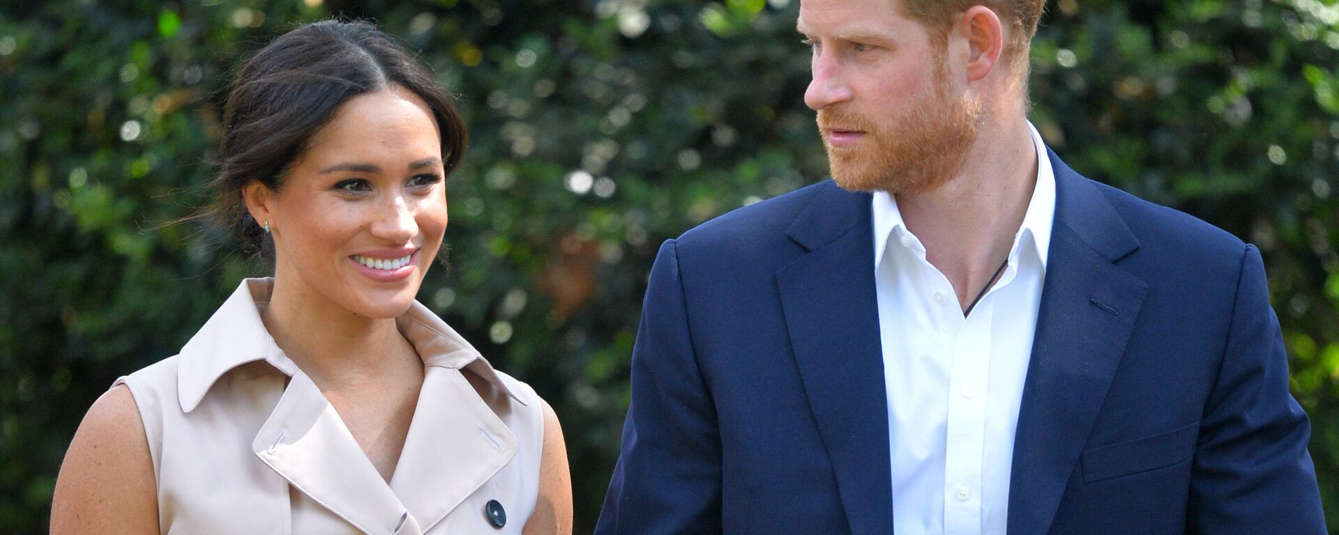 In this Oct. 2, 2019, file photo, Britain's Harry and Meghan, Duchess of Sussex arrive at the Creative Industries and Business Reception at the British High Commissioner's residence in Johannesburg, where they will meet with representatives of the British and South African business communities, including local youth entrepreneurs - Sputnik International, 1920, 23.12.2021