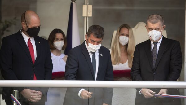 Czech Prime Minister Andrej Babis, right, Israeli Foreign Minister Gabi Ashkenazi, center, and Israeli Public Security Minister Amir Ohana cut a ribbon during a ceremony at the new Embassy of the Czech Republic Jerusalem office in Jerusalem on Thursday, March 11, 2021.  - Sputnik International