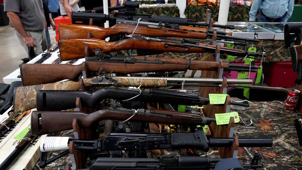 Rifles are displayed for sale at the Guntoberfest gun show in Oaks, Pennsylvania, U.S., October 6, 2017.  - Sputnik International