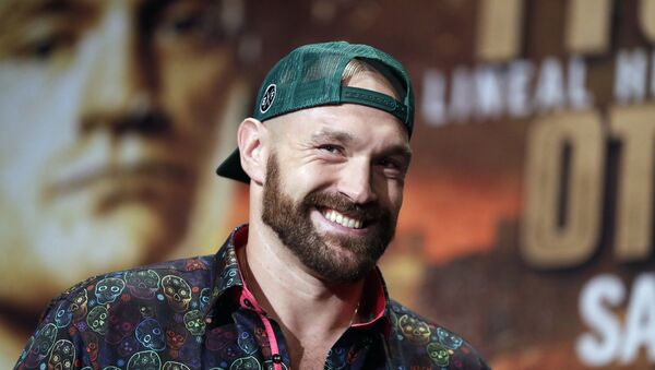 In this Sept. 11, 2019 file photo, Tyson Fury smiles during a press conference in Las Vegas. - Sputnik International