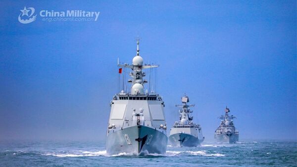 A naval fleet comprised of the guided-missile destroyers Ningbo (Hull 139) and Taiyuan (Hull 131), as well as the guided-missile frigate Nantong (Hull 601), steams in astern formation in waters of the East China Sea during a maritime training drill in late January, 2021 - Sputnik International