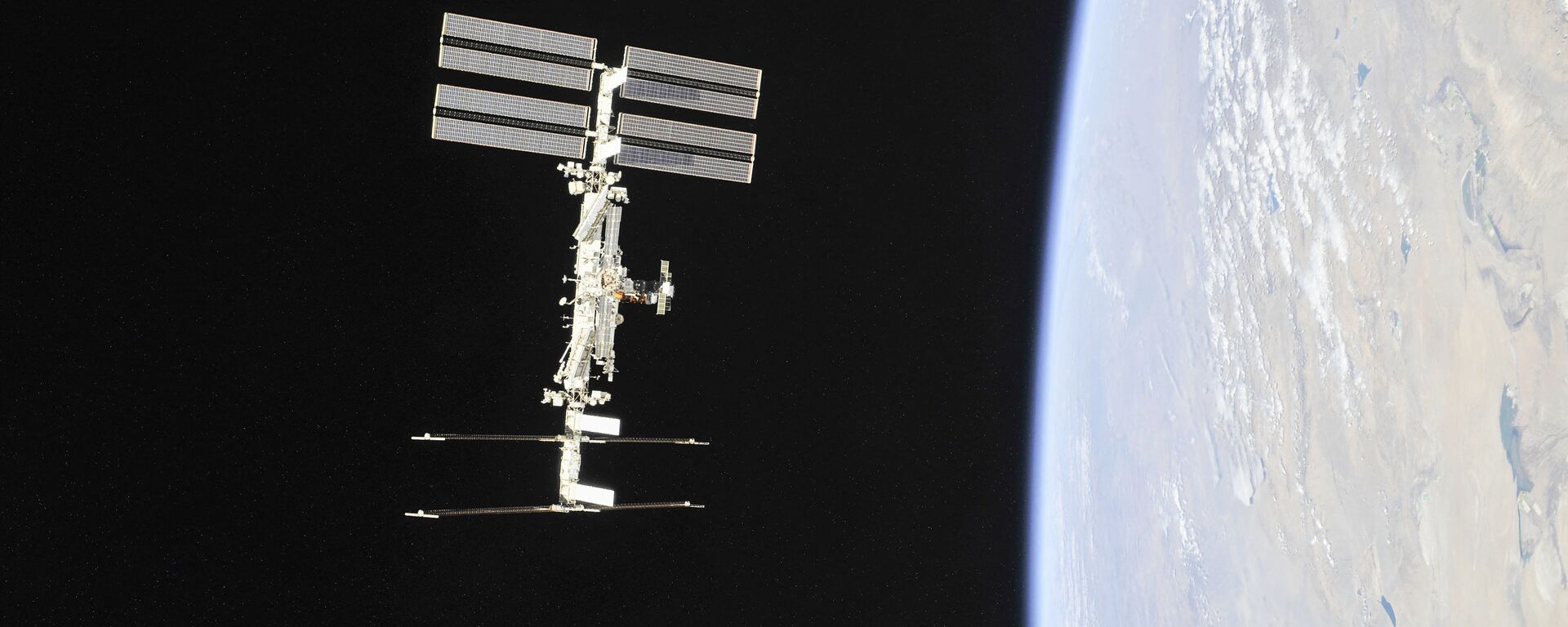 This file NASA handout photo obtained November 4, 2018 shows the International Space Station photographed by Expedition 56 crew members from a Soyuz spacecraft after undocking.  - Sputnik International, 1920, 10.02.2022