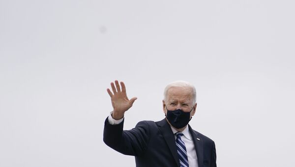 President Joe Biden waves before boarding Air Force One at Andrews Air Force Base, Md., Tuesday, March 16, 2021, en route to Philadelphia International Airport in Philadelphia. - Sputnik International