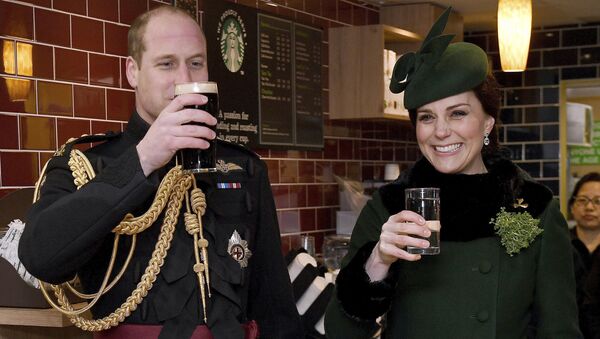 Britain's Kate, the Duchess of Cambridge, smiles as she and Prince William toast, as they visit the 1st Battalion Irish Guards, for the St. Patrick's Day Parade, at Cavalry Barracks, in Hounslow, England, Saturday, March 17, 2018.   - Sputnik International