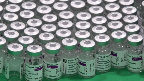 Empty vials of Oxford/AstraZeneca's COVID-19 vaccine are seen at a vaccination centre in Antwerp, Belgium March 18, 2021. REUTERS/Yves Herman - Sputnik International