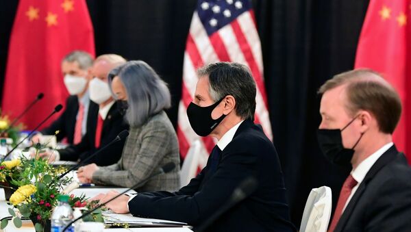 The U.S. delegation led by Secretary of State Antony Blinken (C) and flanked by National Security Advisor Jake Sullivan (R), face their Chinese counterparts at the opening session of U.S.-China talks at the Captain Cook Hotel in Anchorage, Alaska on March 18, 2021. - Sputnik International