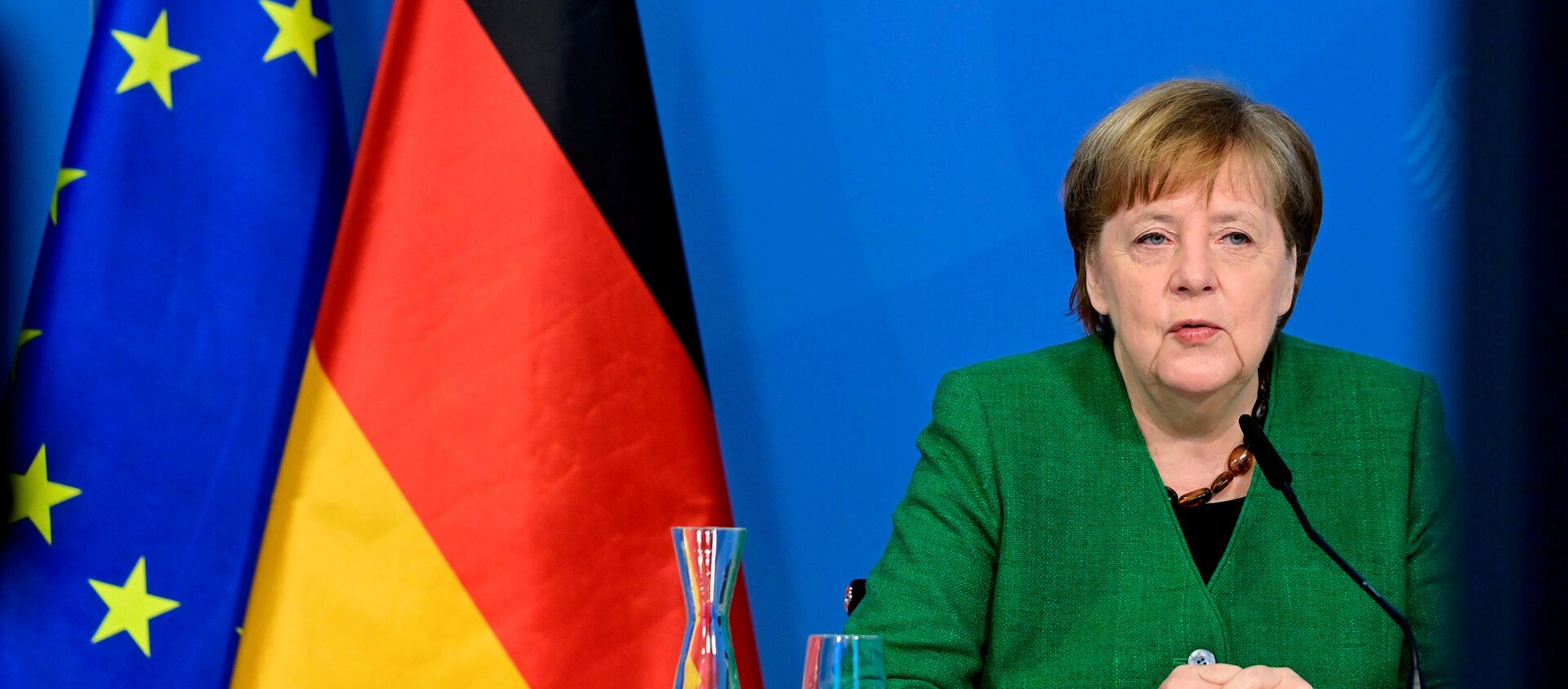 German Chancellor Angela Merkel attends a video-conferenced meeting with representatives of the German Association of Local Utilities of municipally determined infrastructure undertakings and economic enterprises in Berlin, Germany March 9, 2021.  - Sputnik International, 1920