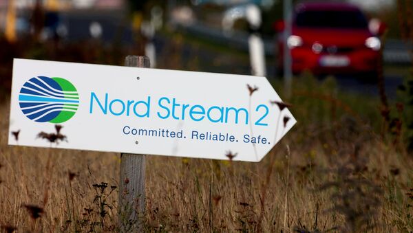 A road sign directs traffic towards the Nord Stream 2 gas line landfall facility entrance in Lubmin, Germany, September 10, 2020.  - Sputnik International