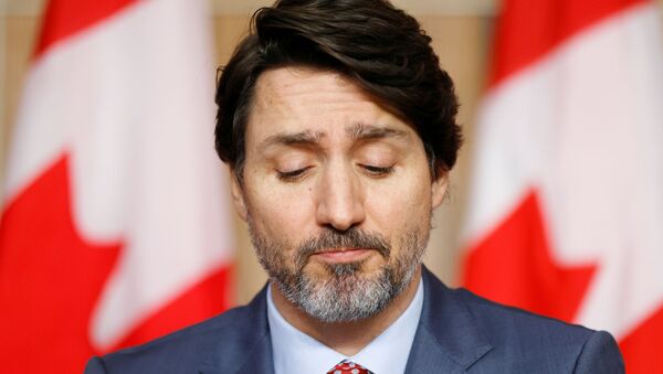 Canada's Prime Minister Justin Trudeau attends a news conference, as efforts continue to help slow the spread of the coronavirus disease (COVID-19), in Ottawa, Ontario, Canada March 19, 2021 - Sputnik International