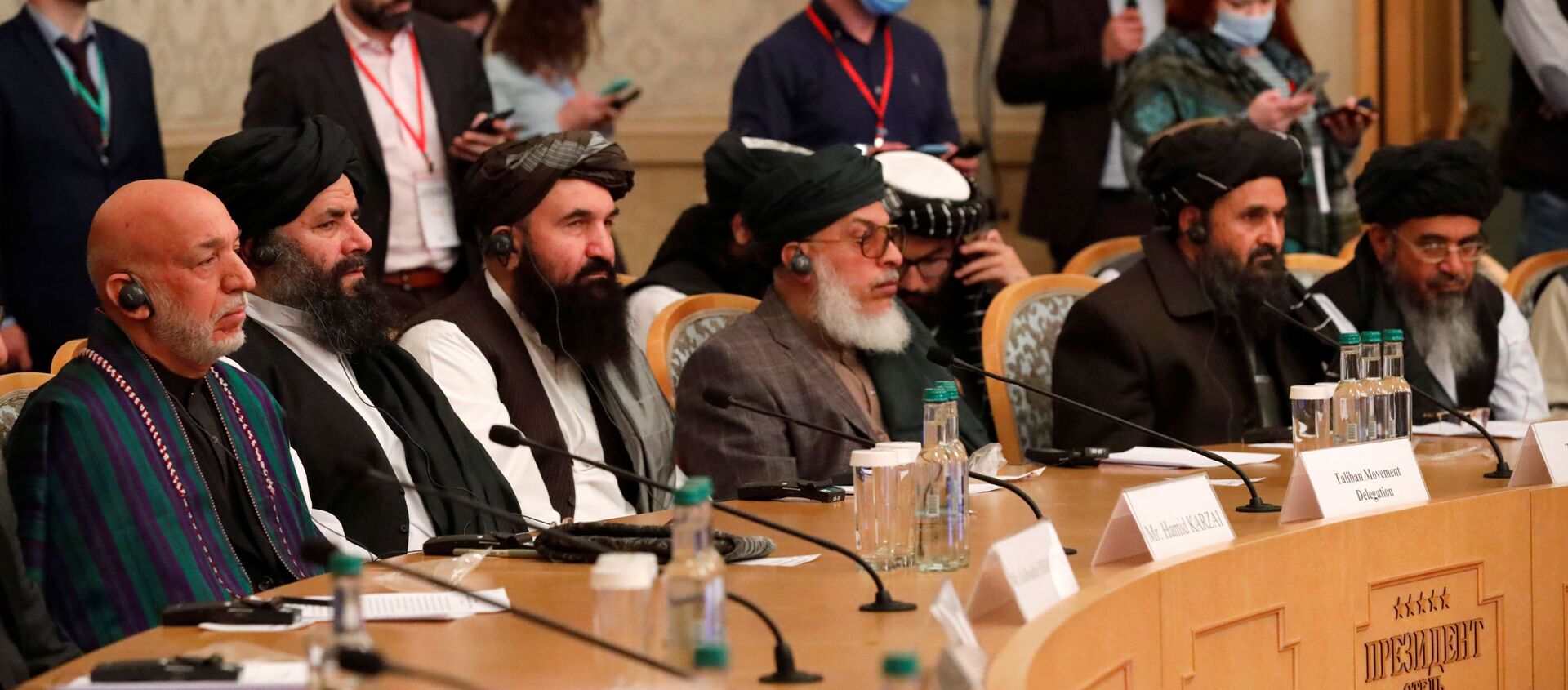 Officials, including Afghan former President Hamid Karzai and the Taliban's deputy leader and negotiator Mullah Abdul Ghani Baradar, attend the Afghan peace conference in Moscow, Russia March 18, 2021. Alexander Zemlianichenko/Pool via REUTERS - Sputnik International, 1920, 13.04.2021