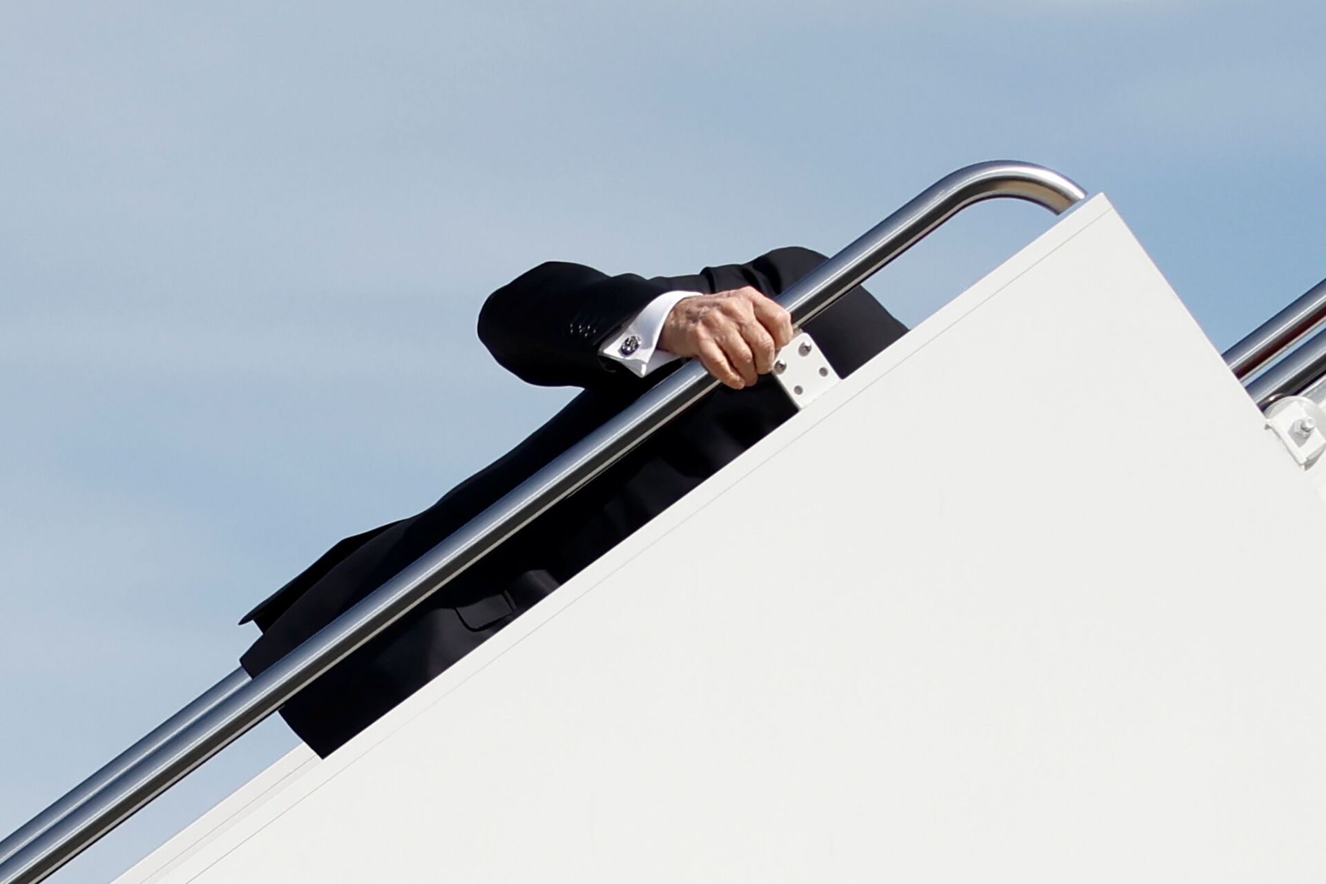 US President Joe Biden grabs onto the railing after he stumbled while boarding Air Force One as he departs Washington on travel to Atlanta, Georgia to promote the $1.9 trillion coronavirus disease (COVID-19) aid package known as the American Rescue Plan, at Joint Base Andrews, Maryland, US, March 19, 2021 - Sputnik International, 1920, 07.09.2021