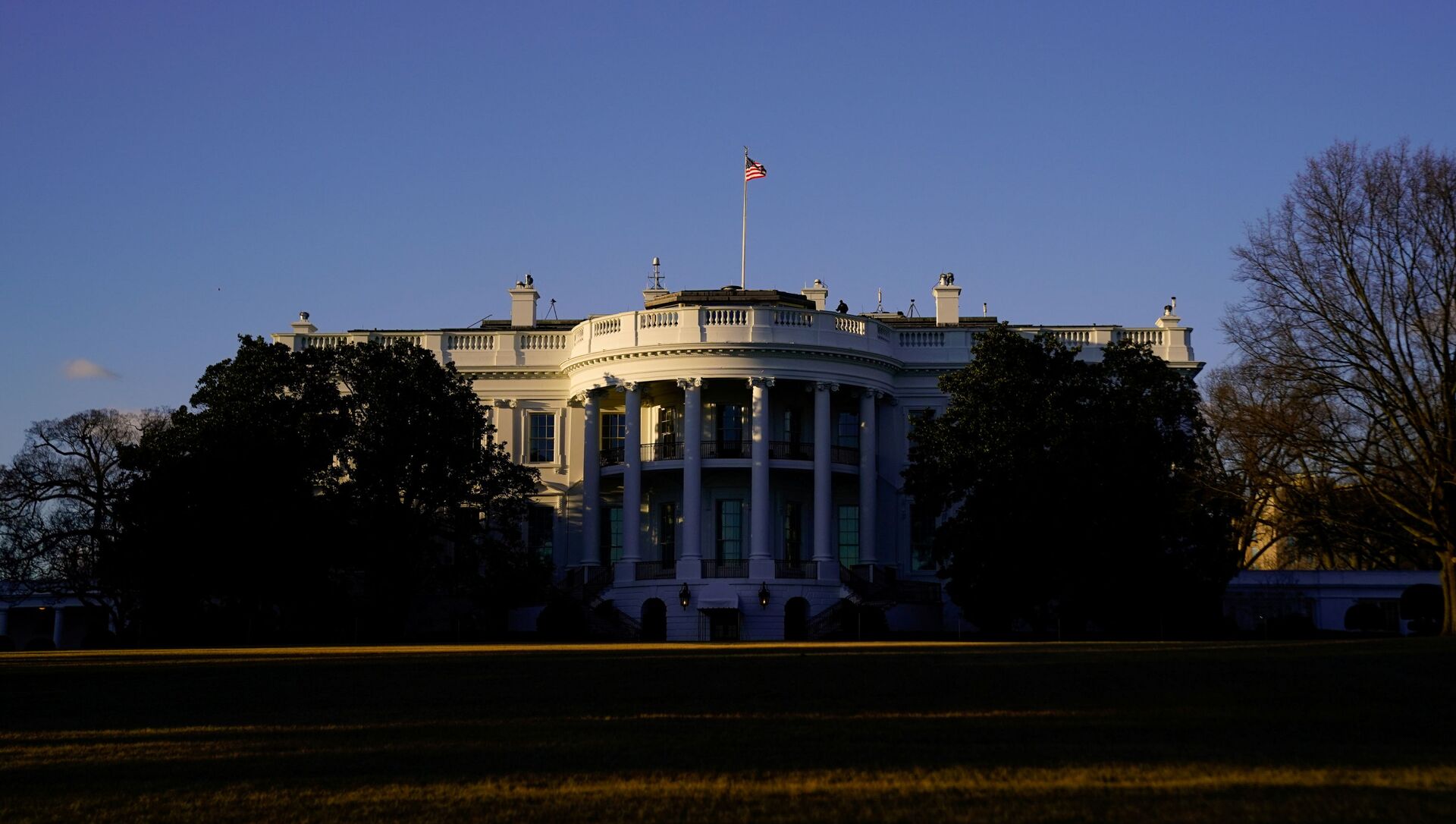 The White House is seen at sunset in Washington, U.S. March 6, 2021. - Sputnik International, 1920, 25.03.2021