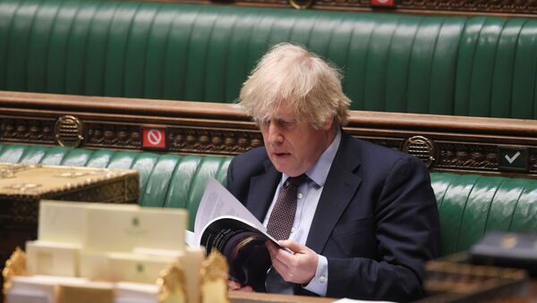 Britain's Prime Minister Boris Johnson attends a parliament session at the House of Commons in London, Britain March 16, 2021 - Sputnik International