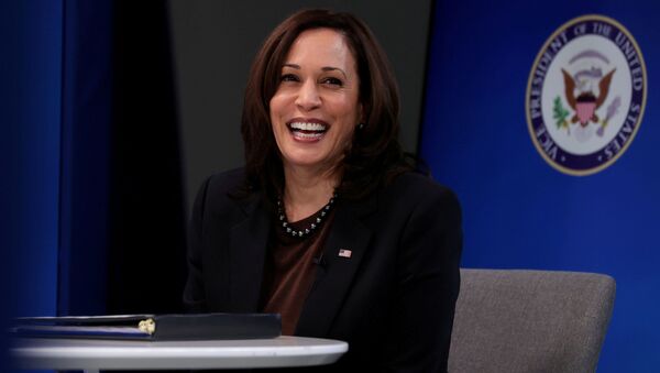 U.S. Vice President Kamala Harris‬ smiles after delivering a keynote address to the House Democratic Caucus virtually on camera from the Eisenhower Executive Office Building at the White House in Washington, U.S. March 2, 2021 - Sputnik International