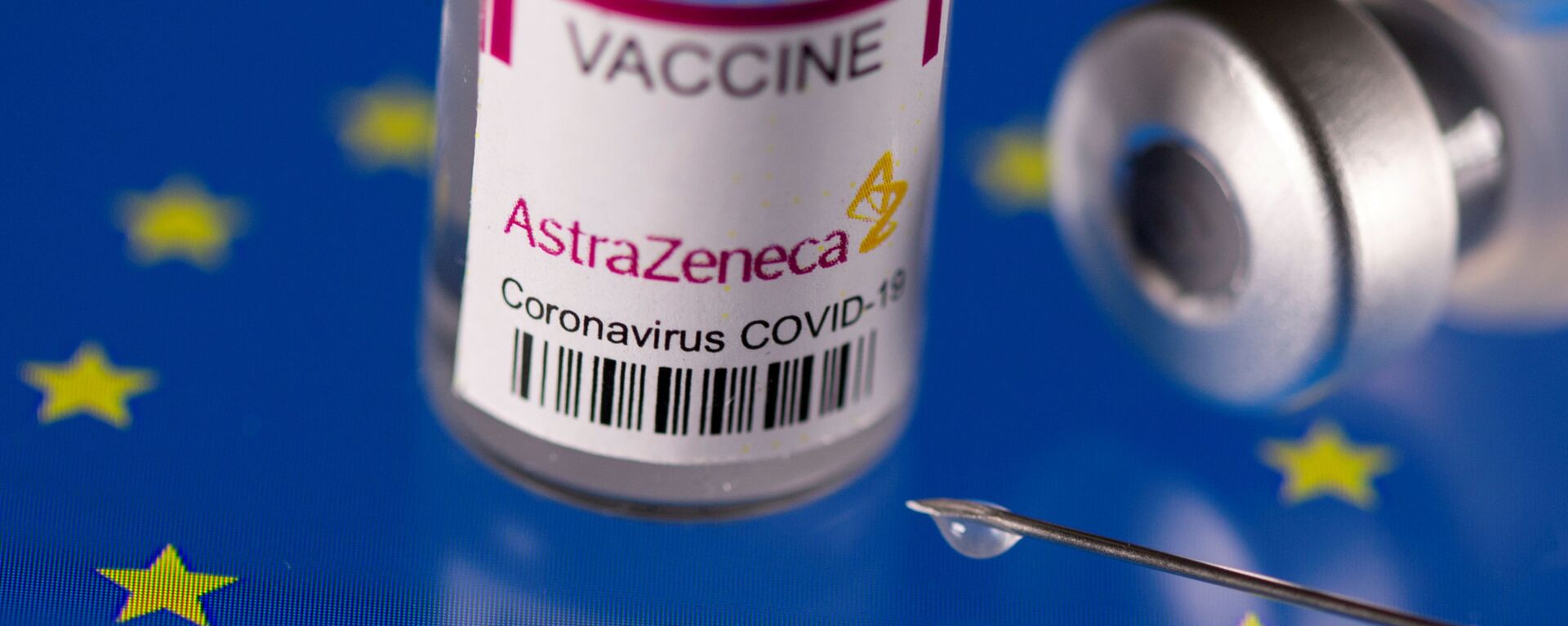 FILE PHOTO: Vials labelled AstraZeneca coronavirus disease (COVID-19) vaccine placed on displayed EU flag are seen in this illustration picture - Sputnik International, 1920