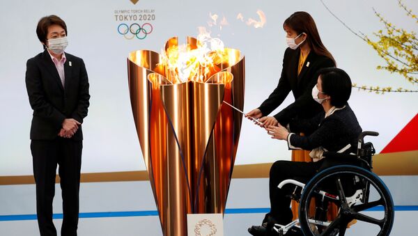 Глава оргкомитета Олимпийских игр 2020 Сэйко Хасимото во время старта эстафеты огня в префектуре Фукусима  - Sputnik International