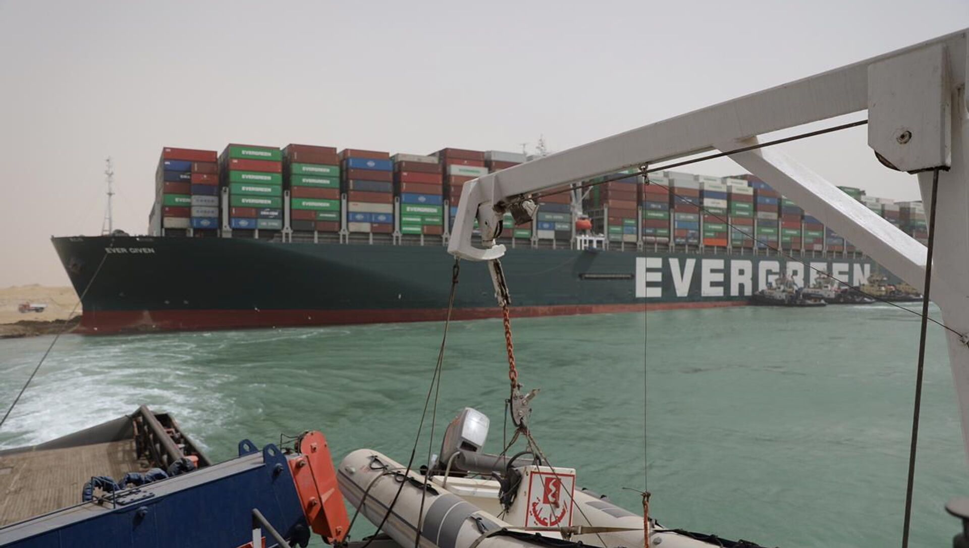Stranded container ship Ever Given, one of the world's largest container ships, is seen after it ran aground, in Suez Canal, Egypt March 25, 2021 - Sputnik International, 1920, 25.03.2021
